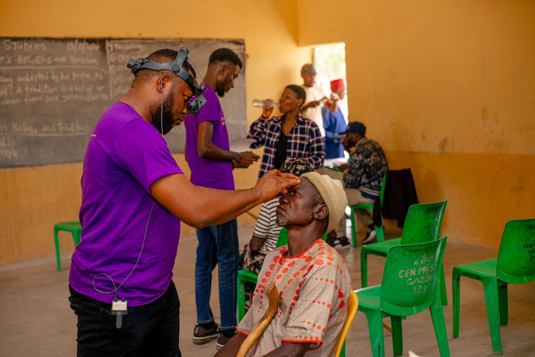 Foundation clinician examining a patient during a rural eye outreach